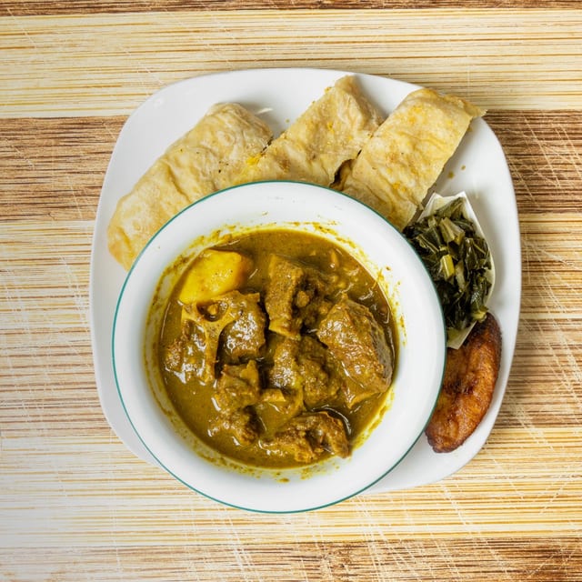 Curry Goat Roti.